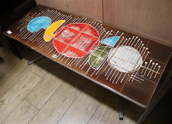 A 1960s tile topped coffee table W.123cm